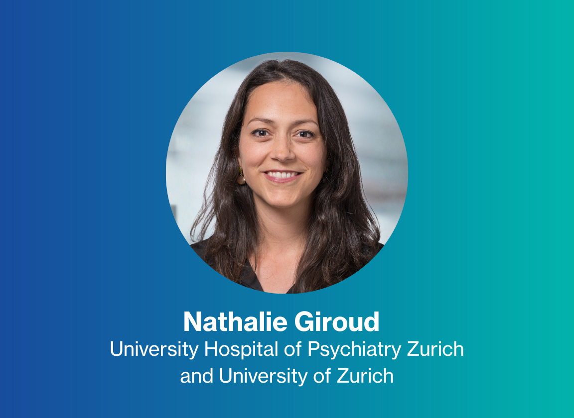Portrait of Nathalie Giroud against a blue background
