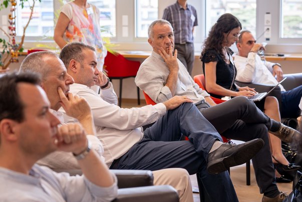 Participants listen attentively