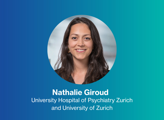 Portrait of Nathalie Giroud against a blue background