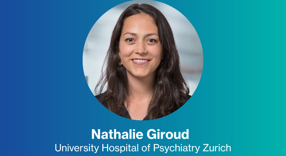 Portrait of Nathalie Giroud against a blue background