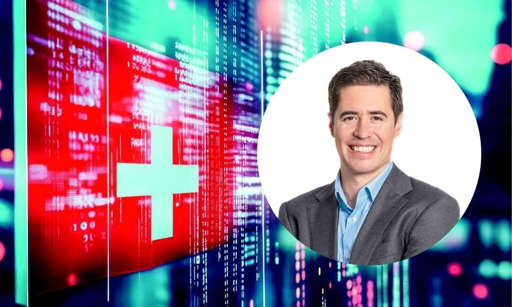 Business professional in front of techthemed Swiss flag